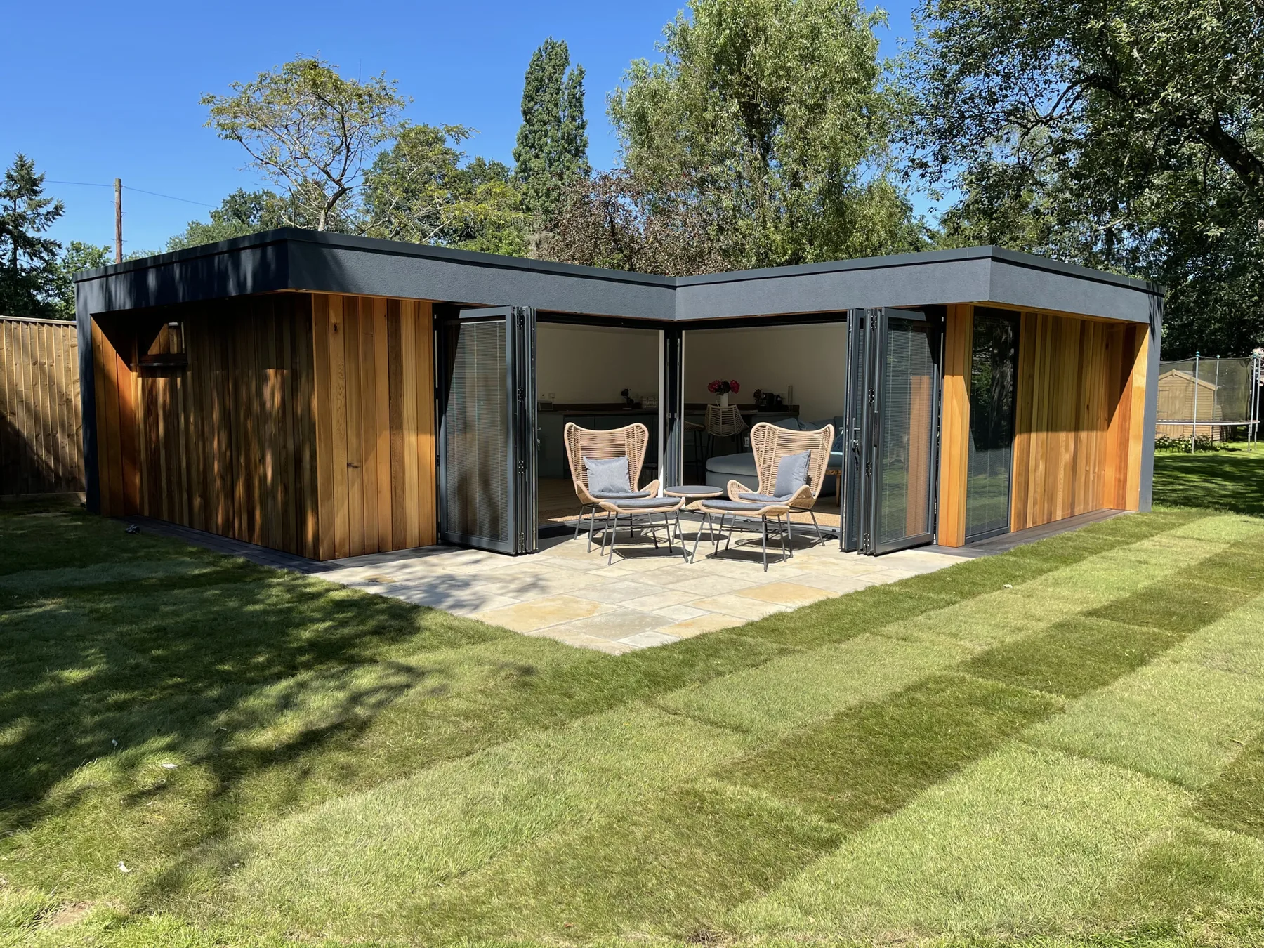 Large contemporary cedar-clad garden room